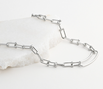 Steel necklace combined links