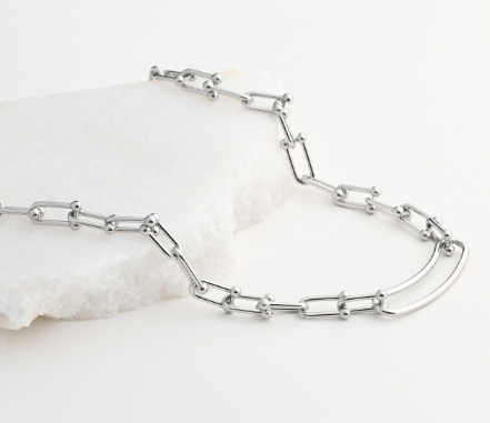 Steel necklace combined links