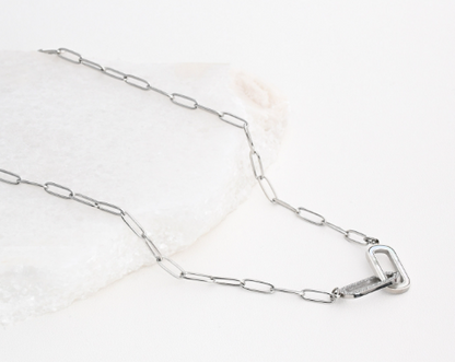 Steel necklace link intertwined
